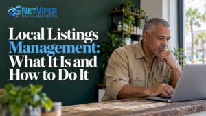 Business owner checking listing details on laptop